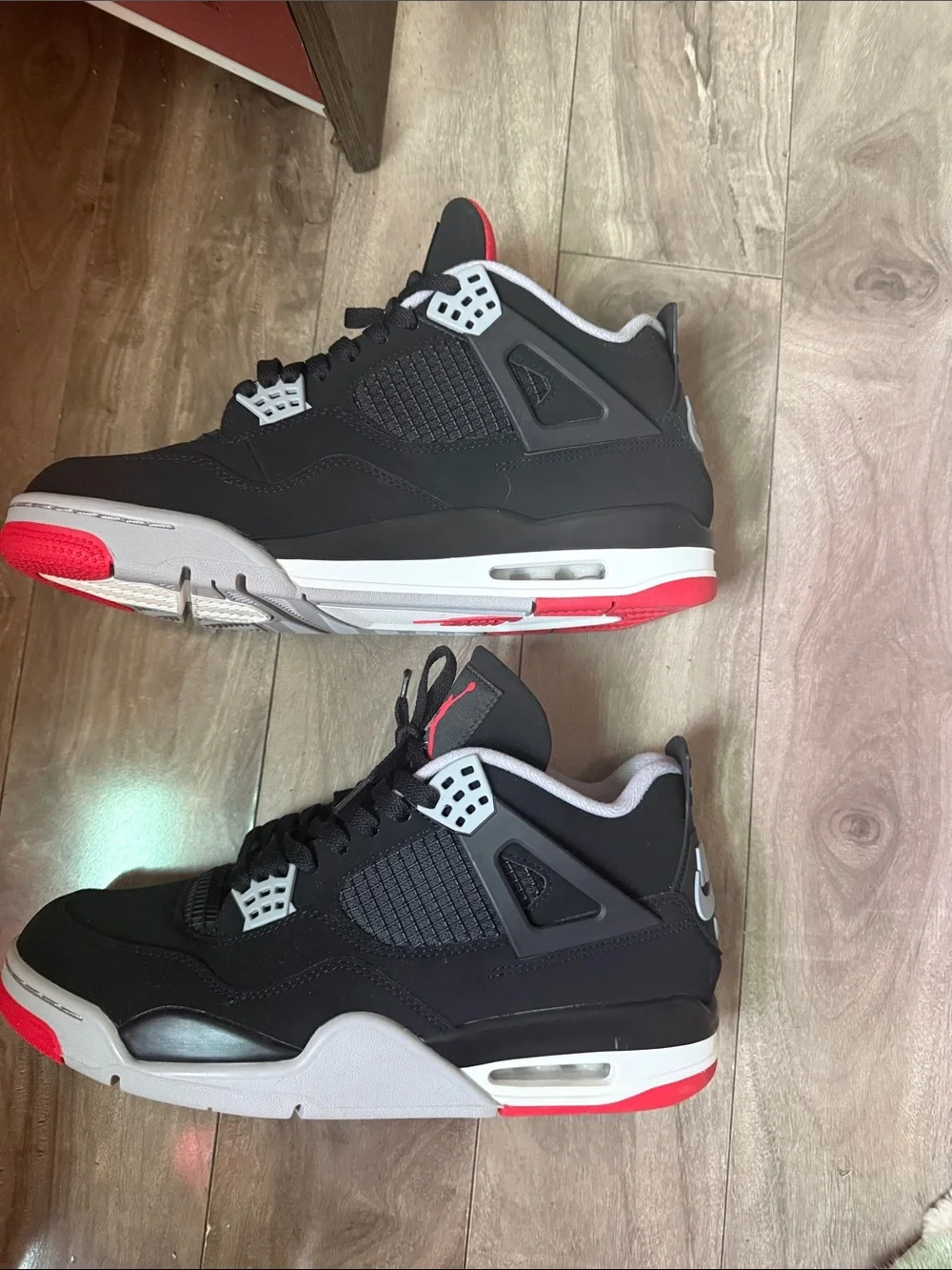 Jordan 4 Men’s Black and Red Retro Basketball Sneakers